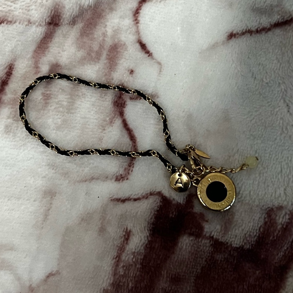 Gold-Tone Charm "A" Bracelet with Black Enamel Disc